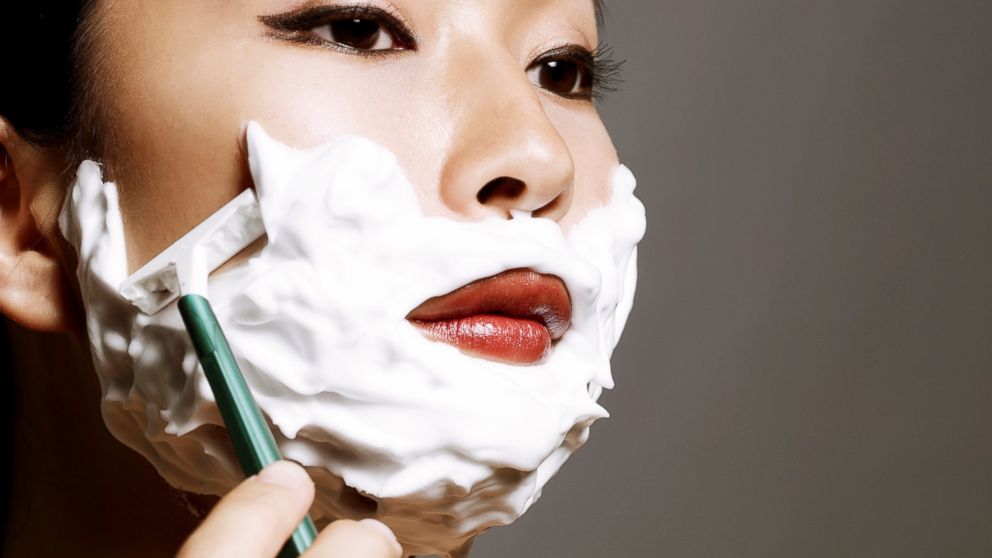 face shaving woman